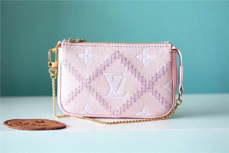 Louis Vuitton Mini Pochette Accessoires Monogram Empreinte Pink For Women. Women-s Handbags. Shoulder Bags And Crossbody Bags 6.1in/15.5cm LV