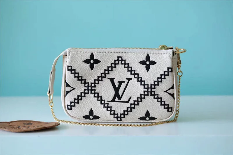 Louis Vuitton Mini Pochette Accessoires Monogram Empreinte White For Women. Women-s Handbags. Shoulder Bags And Crossbody Bags 6.1in/15.5cm LV