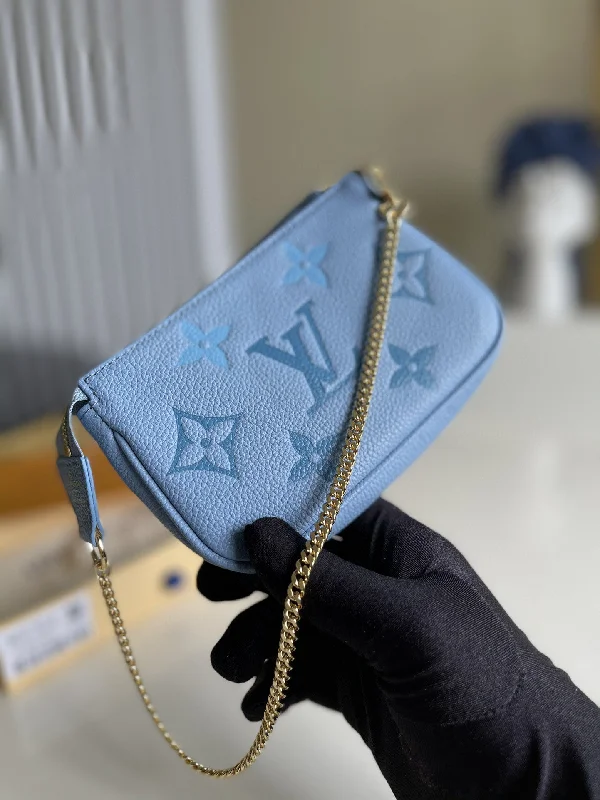 Louis Vuitton Mini Pochette Accessories Monogram Empreinte Blue For Women. Women-s Bags. Shoulder And Crossbody Bags 6.1in/15cm LV