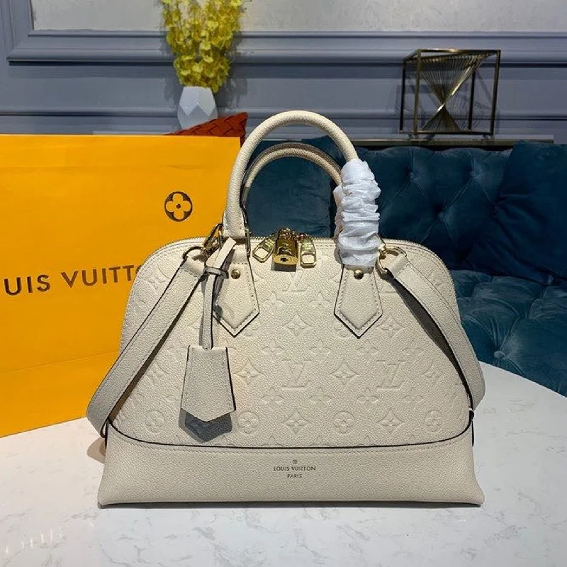 Louis Vuitton Neo Alma PM Monogram Empreinte Creme For Women. Women-s Handbags. Shoulder And Crossbody Bags 13.8in/35cm LV M44834