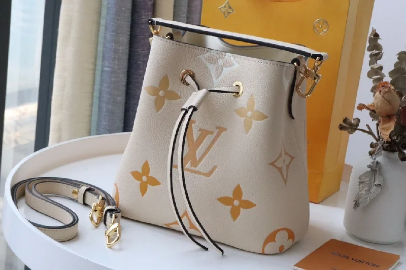 Louis Vuitton NeoNoe BB Bucket Bag Monogram Empreinte Cream/Saffron For Women. Women-s Bags. Shoulder Bags 7.9in/20cm LV M45716