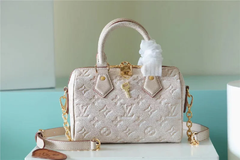 Louis Vuitton Speedy Bandouliere 20 Monogram Empreinte Pale Beige For Women. Women-s Handbags. Shoulder And Crossbody Bags 20.5cm/8.1in LV M46163